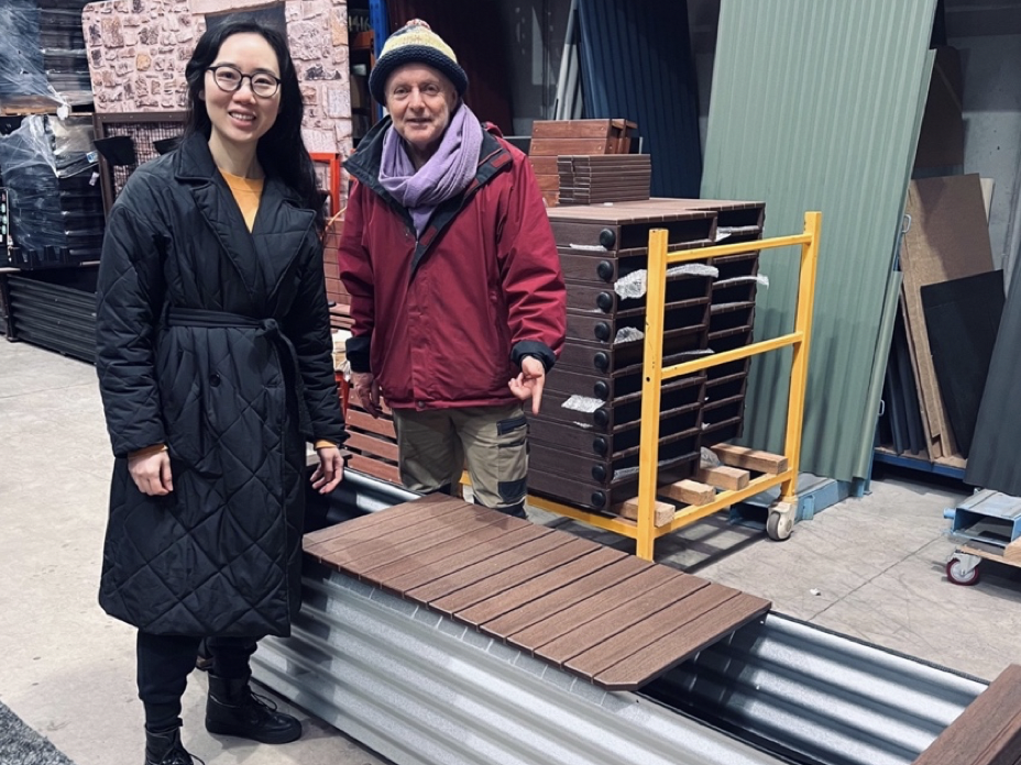 Zoe Wang and Michael Mobbs standing beside a Coolseat, part of the Upsoil Collective project shortlisted as a Fishermans Bend Digital Innovation Challenge finalist by City of Melbourne